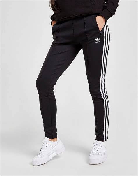 zwarte adidas trainingsbroek dames|Zwarte adidas Trainingsbroeken voor dames online kopen .